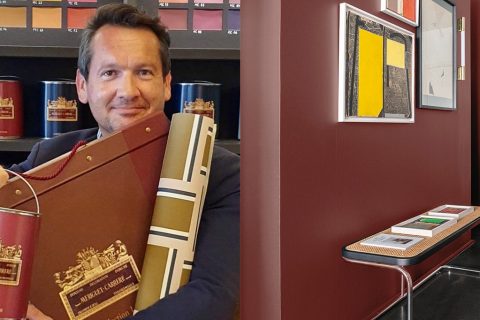 Philippe Courtois - directeur de meriguet carrere paris - showroom meriguet carrère paris - peinture murale - peinture décorative - papier peint inspiration art déco - peinture rouge foncé mate - banc canné - The Socialite Family - meriguet carrere collaborea avec The Socialite Family - signatures Singulières Magazine - magazine digital des talents français
